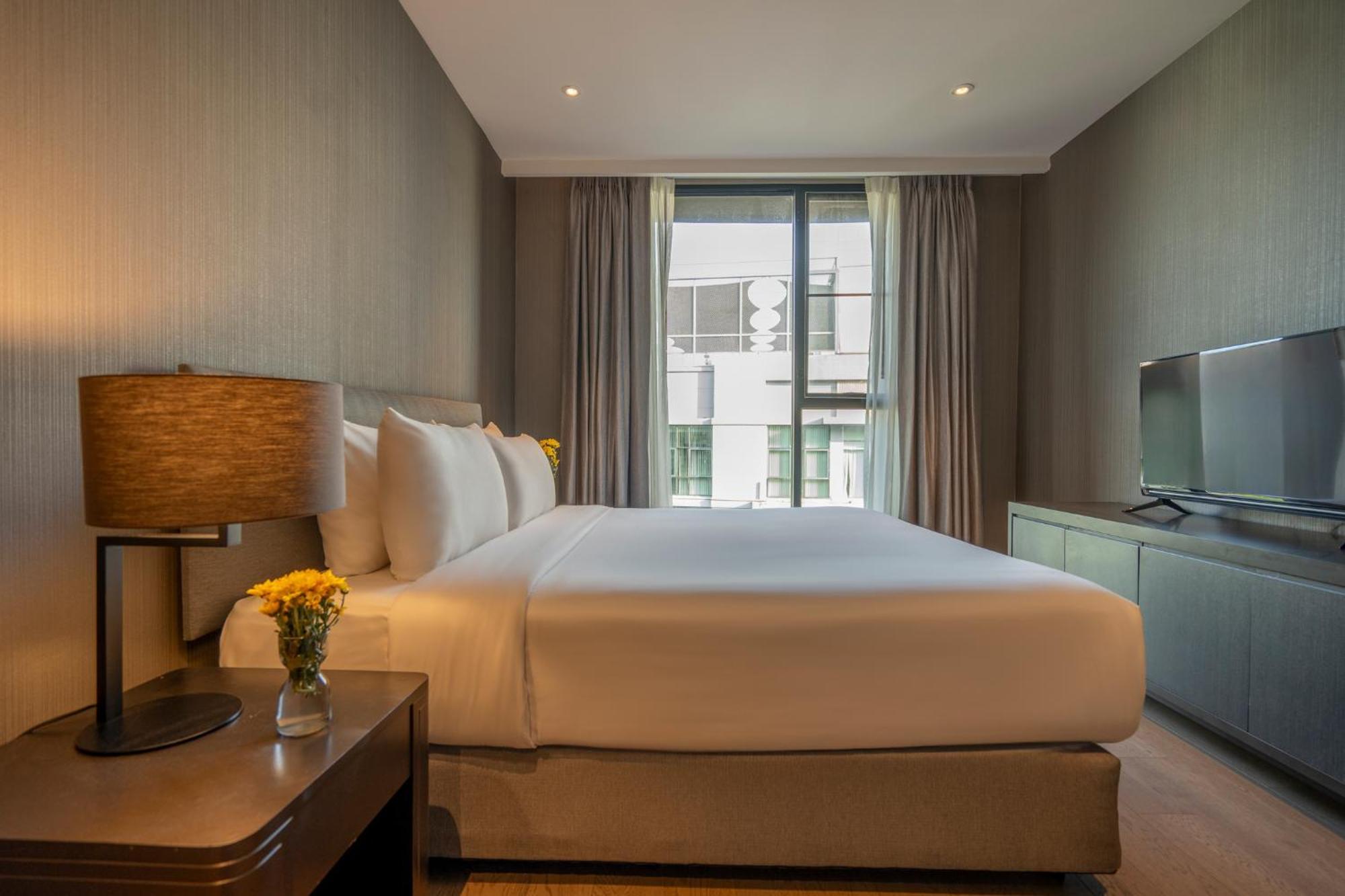 Walton Suites Sukhumvit Банкок Стая снимка